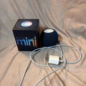 New never been used mini HomePod in dark blue.